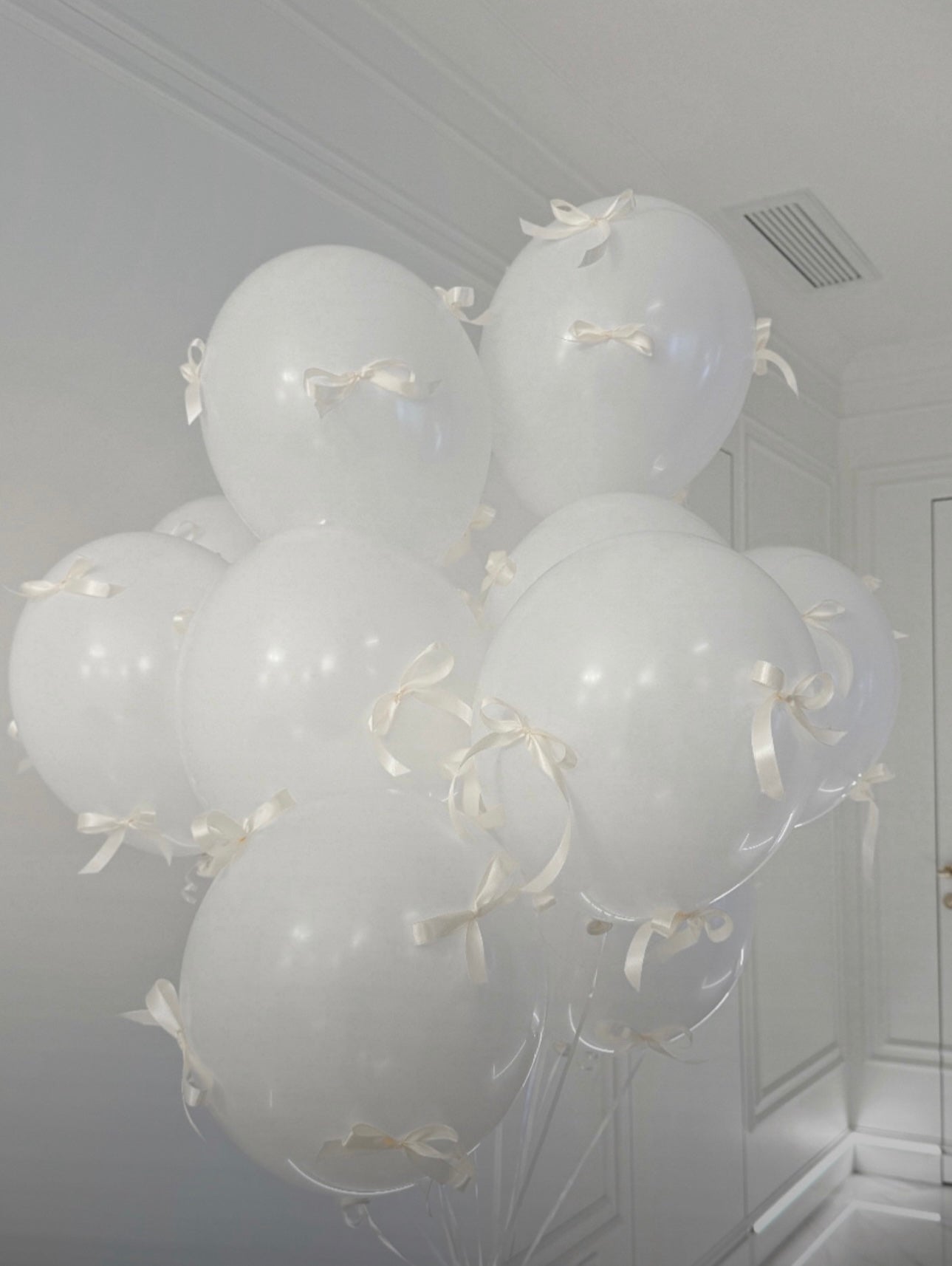 White Balloons with white bows
